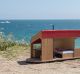 This 12-volt solar-powered Tiny House sleeps two and comes with a kitchen sink and hot shower.