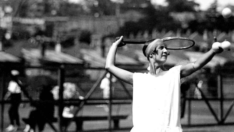 Marjorie Cox Crawford serving during a tennis game, New South Wales, ca. 1930, 2 [picture]