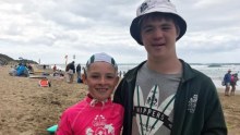 Jared Huysing (right) and his brother at Anglesea for the last day of the nippers season.