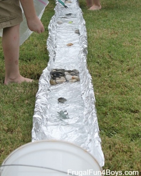 Tin foil river - visit <a href="http://frugalfun4boys.com/2014/08/07/tin-foil-river-outdoor-water-play/" ...