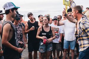 Saturday afternoon action on Tuff St at Summernats 30 in Canberra. A group of men surround a young woman and shout ...