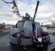 Russia's Ambassador to the Philippines answers questions from reporters beside Russian Admiral during a press conference ...