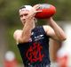 MELBOURNE, AUSTRALIA - NOVEMBER 21: Liam Hulett marks the ball during a Melbourne Demons AFL pre-season training session ...