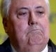 Clive Palmer addresses the media at a press conference on the High Court challenge, in Canberra on Thursday 10 November ...