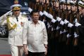 Philippines President Rodrigo Duterte, right,  visits the Russian anti-submarine vessel Admiral Tributs at the port of ...