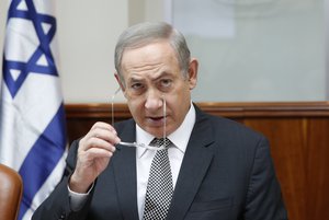 Israeli Prime Minister Benjamin Netanyahu attends the weekly cabinet meeting in Jerusalem, Sunday, Jan. 15, 2017.