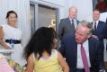 Premier Coiln Barnett talking to four-year-old Rosharnia Ah Hong at the announcement of the $140 million upgrade of ...