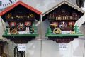 Traditional wooden cuckoo clocks hang on display inside a souvenir shop in Lugano, Switzerland, on Tuesday, Nov. 15, ...