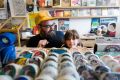 Aaron Coping and his eight-year-old daughter Pippa. Pippa goes to work with her father, as he balances a work and ...