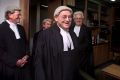 Adrian Smithers and fellow judges in his chambers following his retirement ceremony in 2002.