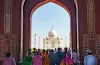 Entering through the main gate, the first glimpse of the Taj Mahal is breathtaking.