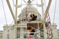 The inauguration platform is prepared on the Capitol steps in Washington. 