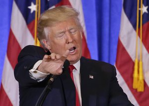 President-elect Donald Trump takes questions during a news conference, Wednesday, Jan. 11, 2017, in New York.