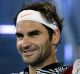 Switzerland's Roger Federer celebrates after defeating Austria's Jurgen Melzer