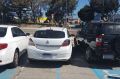 The car was parked over the blue dividing line. ACROD bays are typically wider than an average parking space.