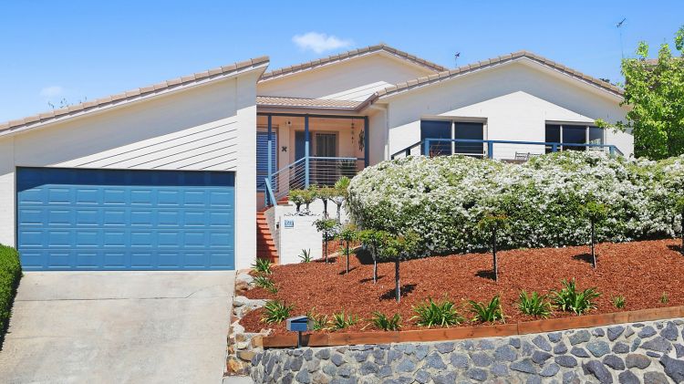 This house at 21 Mountain Circuit is among the houses in Calwell on the market.