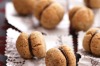 Hazelnut and chocolate baci di dama. <a ...