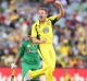 James Faulkner of Australia celebrates the wicket of Sharjeel Khan of Pakistan at the MCG on Sunday.