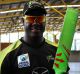 Big impact: Carlos Brathwaite shows off his new bat.