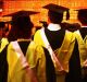 AFR, GENERIC, GRADUATE University students at their graduation ceremony --- graduates, higher education, tertiary ...