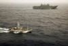 HMAS Adelaide shadows a suspected Chinese drug ship