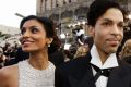 Prince arrives with his then wife Manuela Testolini for the 2005 Academy Awards in Los Angeles. 