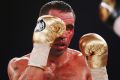 Welfare concerns: A bloodied Anthony Mundine during his last outing, a bad loss to Charles Hatley in November 2015.