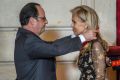 Francois Hollande awards the Legion d'Honneur   to US Ambassador to France, Jane D Hartley on January 16 at the Elysee ...