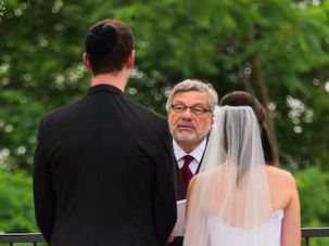 Seymour Rosenbloom presides over daughter’s wedding.