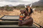 Sarara Camp lodge guide searches for wildlife in the Sarara conservancy.