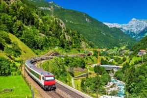An Intercity train on the old Gotthard railway through the spectacular pass in Siwtzerland.