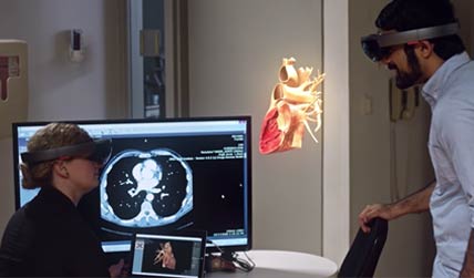 man and woman using virtual reality headset to see the human body click to open video popup