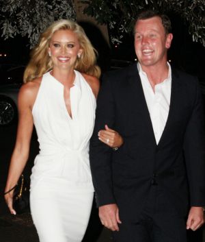 Anthony Bell and Kelly Landry arrive at Catalina Restaurant in February 2011 for their surprise wedding party.