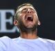 Britain's Daniel Evans celebrates after defeating Croatia's Marin Cilic in their second round match at the Australian ...