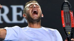 A perspiring Dan Evans celebrating his win over Marin Cilic.