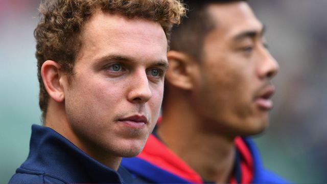 MELBOURNE, AUSTRALIA - OCTOBER 01: Mitch Wallis and Lin Jong of the Bulldogs watches on from the sidelines during the ...