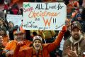CLEVELAND, OH - DECEMBER 24:  Cleveland Browns fans celebrates after defeating the San Diego Chargers 20-17 at ...