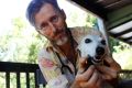 Dr Edward Bassingthwaighte administers a cannabis-based treatment to Pearl the whippet.