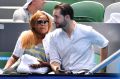 Williams' fiance, Alexis Ohanian, with Williams' sister, Isha Price, in the players' box.