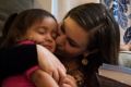 Rachel McCormick and her husband Irvi Cruz with their daughters Ana, 2, and Sara, 4, at their apartment in Harlem. ...