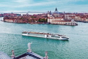 The River Countess sails through Venice.