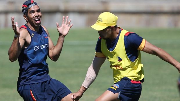 Re-contracted Crow Eddie Betts has a laugh with teammate Charlie Cameron.