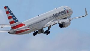 In this Friday, June 3, 2016, photo, an American Airlines passenger jet takes off from Miami International Airport in ...