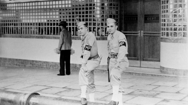 American military police outside Brisbane's Central Hotel in 1942. Their presence caused resentment among Australians.