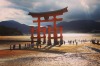 This photo was taken at Miyajima Island in the afternoon on a humid day. The light through the clouds and the shadows of ...