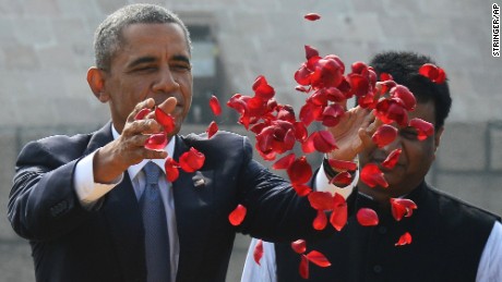 Obama offers floral tribute at the site where Indian independence icon Mahatma Gandhi was cremated in New Delhi.