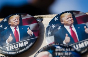 Buttons for sale are posted as preparations continue for Friday's inauguration of Donald Trump in Washington, Wednesday, ...