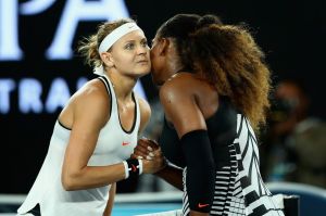 Serena Williams shakes hands at the net after victory in her second round match against Lucie Safarova