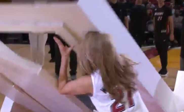 Heads up! A fake door nearly crushes a young Miami Heat fan at Thursday's game.