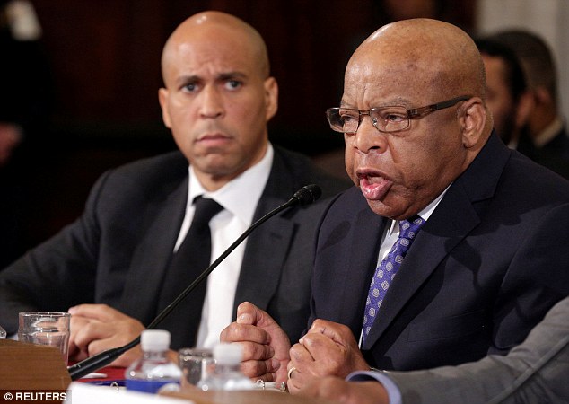 Cory Booker, one of the Senate's two black Democrats, (left) says he will attend despite a dispute between Lewis (right) and Trump